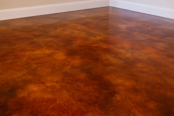 a red epoxy floor from Concrete King Dallas in Dallas, TX - Concrete Retaining Walls